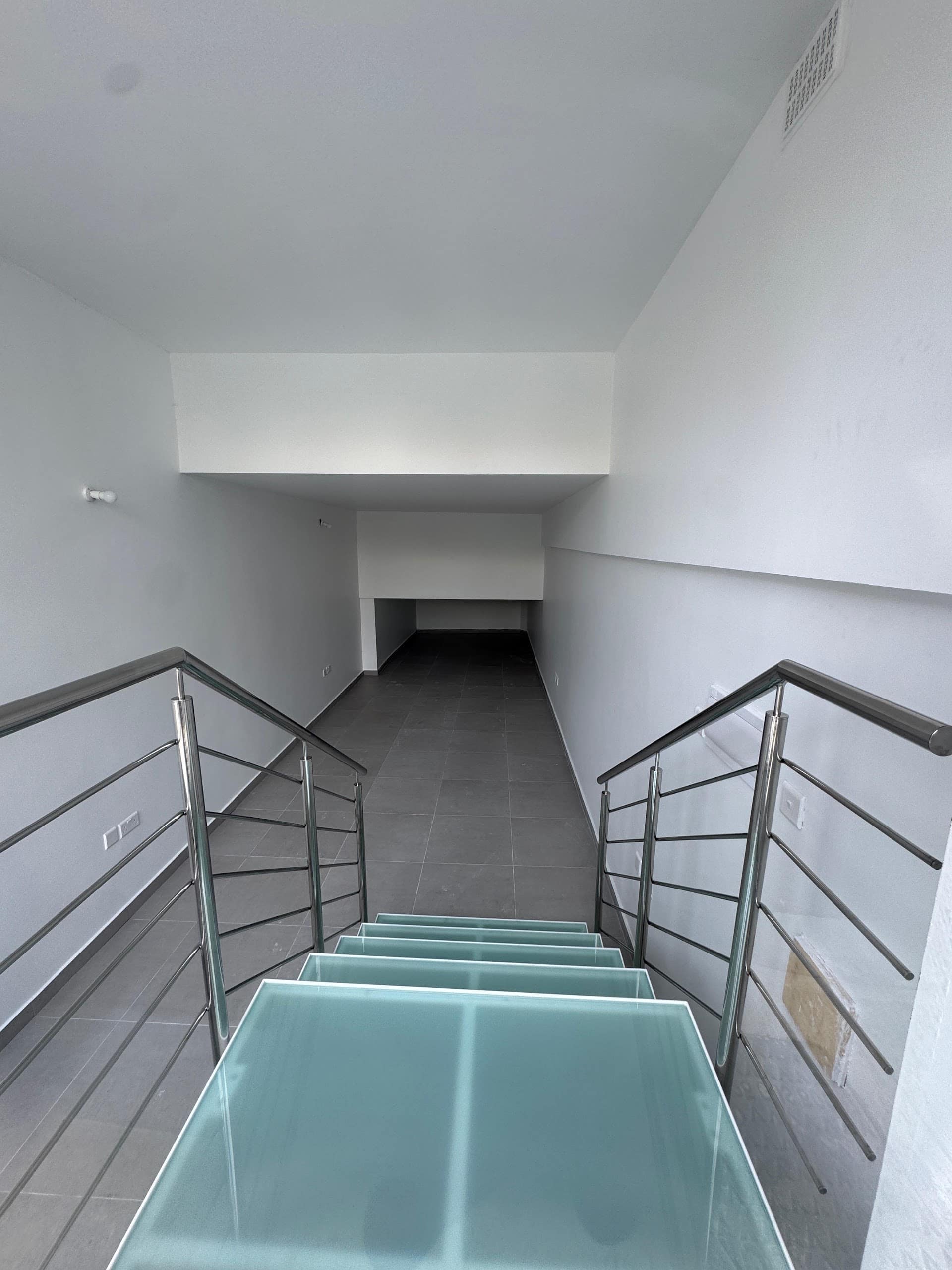 Stair access to the semi-basement unit at Msida Park Residence